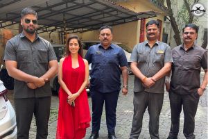 A picture of Nushrratt Bharuccha with personal bodyguards for her close protection from WENS FORCE given to her for her recent visit to Siddhivinayak Temple for her new Range Rover.